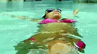 monika fox heats up the pool in her skimpy pink bikini