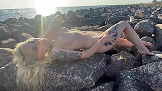 blonde beach exhibitionist's wet clit play builds to shuddering public orgasm
