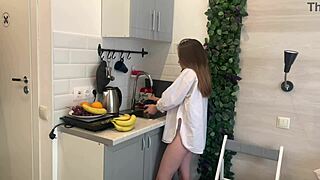 with nothing left, this pretty teen moans using a banana in the kitchen