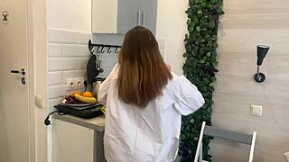 with nothing left, this pretty teen moans using a banana in the kitchen