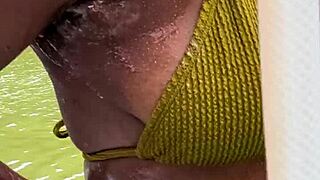 imagine soap bubbles popping on that ebony milf's bikini in the jungle shower under forest views