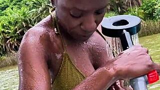 imagine soap bubbles popping on that ebony milf's bikini in the jungle shower under forest views