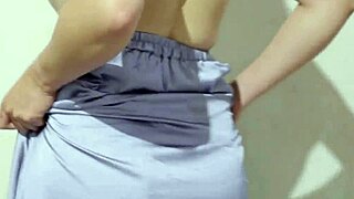 indonesian girl tries new satin skirt
