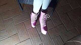Sitting on a chair in pantyhose and high heeled boots