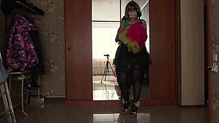 a gorgeous ass tries short skirts in mirror
