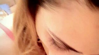 Young girl with red lipstick gives blowjob on redvideos