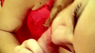 Young girl with red lipstick gives blowjob on redvideos