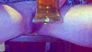pissing inside a vase at the bar