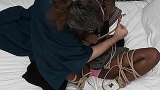 Tied up ebony schoolgirl made to cum hard