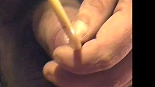 masked guy squirts milk from cock