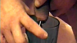 masked guy squirts milk from cock