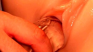 fake cock goes in her pussy