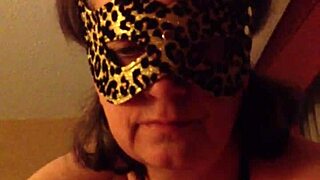 Masked mature milf sucks husband's cock in costume
