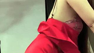 she's dancing in lace skirt, showing off her legs and tits.