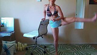 Stretching Your Neck In Yoga Shorts With Cameltoe And Barefoot Feet