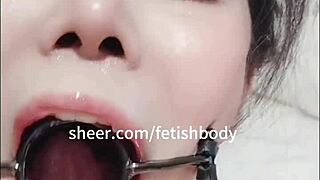 Bound Temptation with Rope Marks, Drooling Ball Gag, Teasing Tongue Play, and Deepthroat Tears.