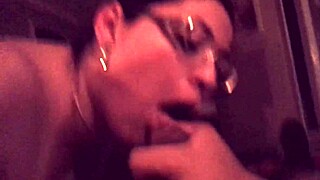 in a cozy hotel room, she eagerly performs a blowjob on her partner, savoring every moment