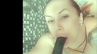 Brazilian beauty pleases herself with toy in bathroom