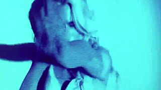 sexy blonde dances on stage with hot body, ripping clothes in striptease