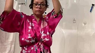 Anna dances teasingly in her robe