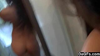 Check out this shaved teen teasing her big tits in the mirror