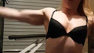 Fitness instructor undresses for erotic display