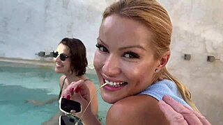 brunette lesbians enjoy outdoor pool party with costumes