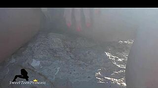 Brunette relieves herself at the beach and teases her boyfriend