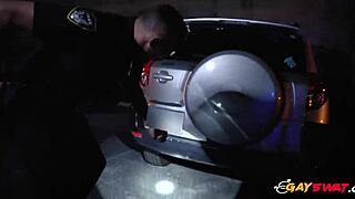 Two gay cops engage in intense interracial action, sucking and riding a big black cock outdoors in a hardcore scene.