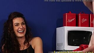 Can the clothed brunette resist watching the fetish scene?
