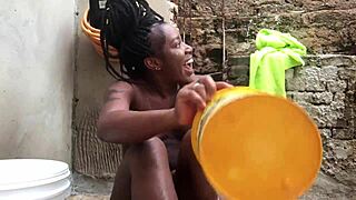Oh, watch this black teen prostitute bathing in the backyard!