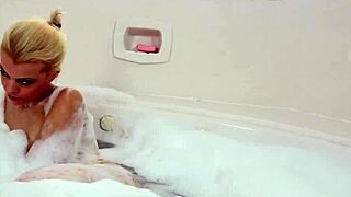 Big-titty Nadia White teases solo in steamy bath play