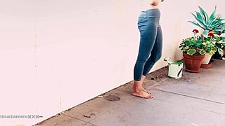 Asian Tina's desperate pee outside on the balcony