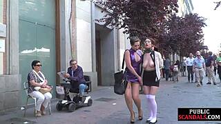 busty lady submits publicly with voyeurs watching her every move