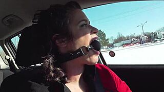 Is this housewife a bound whore driving gagged in public?