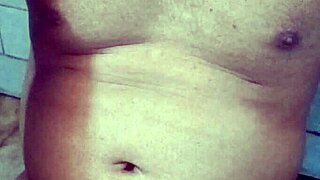 Indian gay bottom takes his own golden shower, pissing on himself in a solo act of self-pleasure