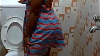 After a shower, this ebony couple gets into doggystyle pounding.