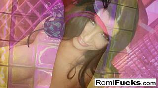 Why Does Romi Tease Solo with Hot Music and Big Tits on Display?