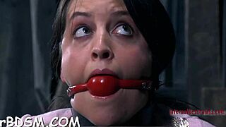 Marvelous tied up babe receives lusty whipping on her body