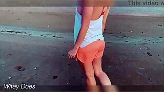Amateur babe flashes her big tits at the sunset.