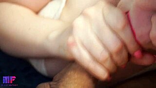 This babe performs a close-up scene with red lips