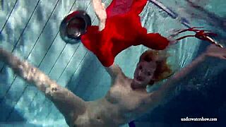 Russian teen lucie enjoys underwater swimming in the pool