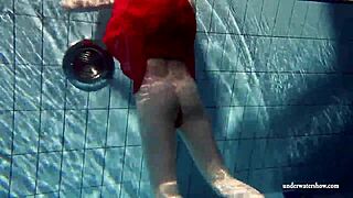 Russian teen lucie enjoys underwater swimming in the pool