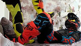 Motocross gay boots tread in biker costumes.