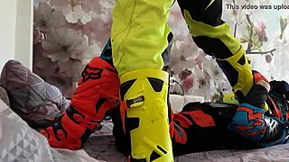 Motocross gay boots tread in biker costumes.