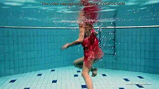 Beautiful Russian teen Duna Bultihalo bathes in bikini underwater