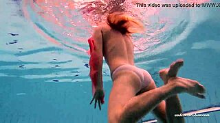 Beautiful Russian teen Duna Bultihalo bathes in bikini underwater