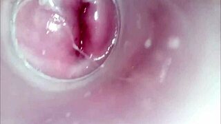 Intimate view of woman pleasuring herself with a large dildo