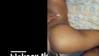 An African girl bends over for doggystyle in the scene.