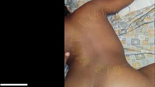 An African girl bends over for doggystyle in the scene.